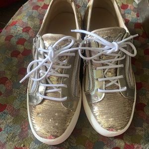 BNWOT unworn Giuseppe Zanotti gold sequin sneaker.